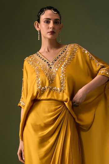 Prahnaaya Yellow Satin V-neck Hand Embroidered Top And Wrap Skirt Set at Aza Fashions Prahnaaya_Yellow Satin V-neck Hand Embroidered Top And Wrap Skirt Set _at_Aza_Fashions