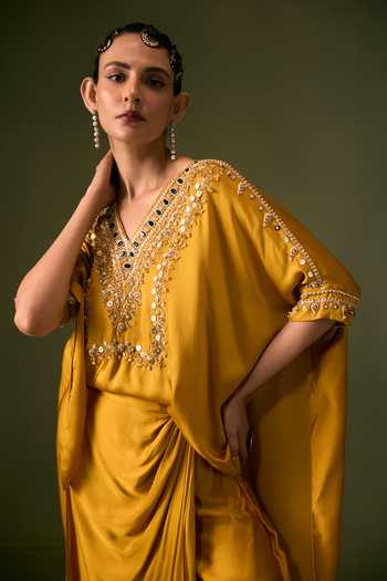 Shop Prahnaaya Yellow Satin V-neck Hand Embroidered Top And Wrap Skirt Set Shop_Prahnaaya_Yellow Satin V-neck Hand Embroidered Top And Wrap Skirt Set