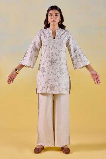 Shop Kapaas Beige Linen Split V-neck Oat Bloom Embroidered Kurta And Pant Set Online at Aza Fashions Shop_Kapaas_Beige Linen Split V-neck Oat Bloom Embroidered Kurta And Pant Set _Online_at_Aza_Fashions
