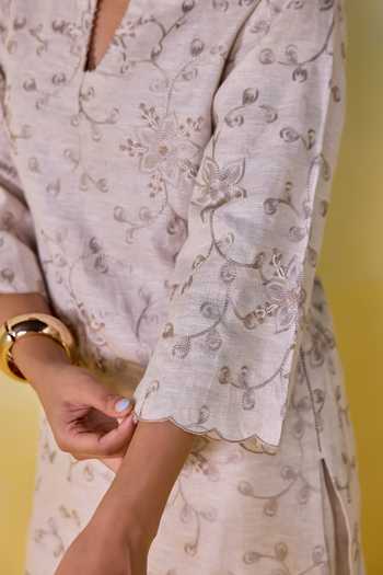 Kapaas Beige Linen Split V-neck Oat Bloom Embroidered Kurta And Pant Set at Aza Fashions Kapaas_Beige Linen Split V-neck Oat Bloom Embroidered Kurta And Pant Set _at_Aza_Fashions