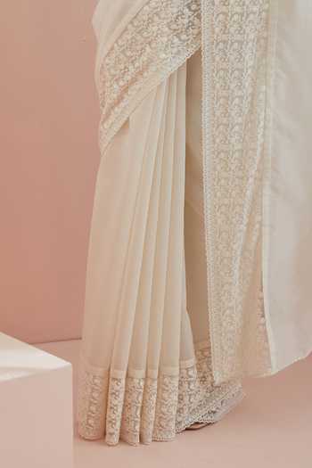 Vinusto Off White Chanderi, Textured Cotton Pristine Embroidered Saree With Blouse For Kids at Aza Fashions Vinusto_Off White Chanderi, Textured Cotton Pristine Embroidered Saree With Blouse For Kids_at_Aza_Fashions