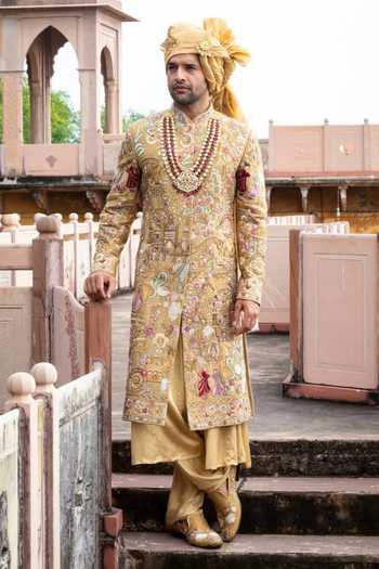 Buy Courtyard By Abhi Gold Silk Rajsi Raw Embroidered Sherwani Set Online at Aza Fashions Buy_Courtyard By Abhi_Gold Silk Rajsi Raw Embroidered Sherwani Set _Online_at_Aza_Fashions
