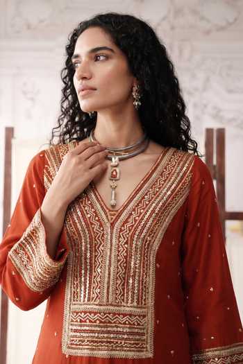 Basanti Kapde aur Koffee_Orange Viscose Georgette V-neck Rust Elan Embroidered Kurta And Pant Set _at_Aza_Fashions