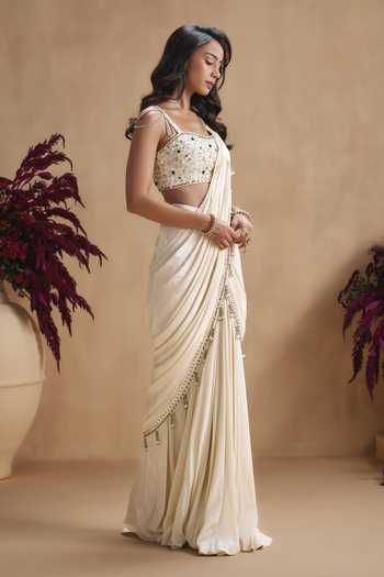 Niamh By Kriti Ivory Silk, Crepe Square Neck Hand Embellished Pre-draped Saree Set Online at Aza Fashions Niamh By Kriti_Ivory Silk, Crepe Square Neck Hand Embellished Pre-draped Saree Set _Online_at_Aza_Fashions