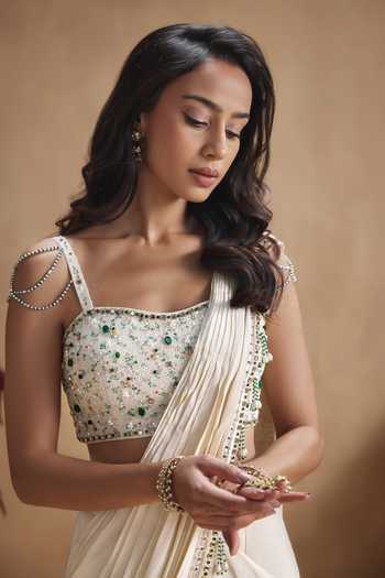 Niamh By Kriti Ivory Silk, Crepe Square Neck Hand Embellished Pre-draped Saree Set at Aza Fashions Niamh By Kriti_Ivory Silk, Crepe Square Neck Hand Embellished Pre-draped Saree Set _at_Aza_Fashions