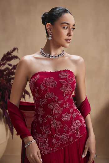 Niamh By Kriti Maroon Georgette, Satin, Chiffon Bandeau Neck Bloom Top And Lehenga Set at Aza Fashions Niamh By Kriti_Maroon Georgette, Satin, Chiffon Bandeau Neck Bloom Top And Lehenga Set _at_Aza_Fashions