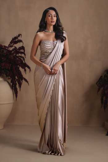 Niamh By Kriti Gold Silk Satin, Shantoon Sequins, Champagne Cascade Draped Saree With Corset Online at Aza Fashions Niamh By Kriti_Gold Silk Satin, Shantoon Sequins, Champagne Cascade Draped Saree With Corset _Online_at_Aza_Fashions