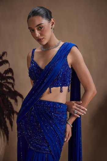 Shop Niamh By Kriti Blue Georgette, Satin V-neck Cobalt Celeste Draped Saree With Embroidered Blouse Online at Aza Fashions Shop_Niamh By Kriti_Blue Georgette, Satin V-neck Cobalt Celeste Draped Saree With Embroidered Blouse _Online_at_Aza_Fashions