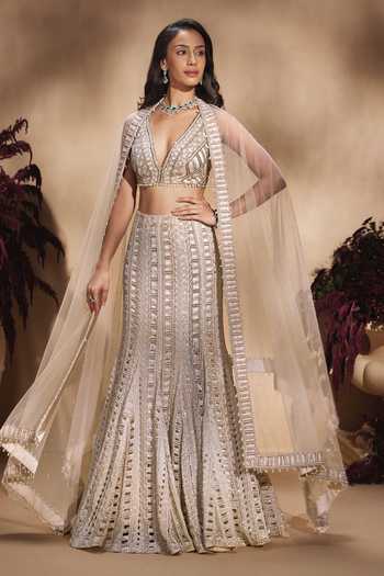Shop Niamh By Kriti Gold Organza, Satin, Net V-neck Moonlit Hand Embroidered Fishcut Lehenga Set Online at Aza Fashions Shop_Niamh By Kriti_Gold Organza, Satin, Net V-neck Moonlit Hand Embroidered Fishcut Lehenga Set _Online_at_Aza_Fashions