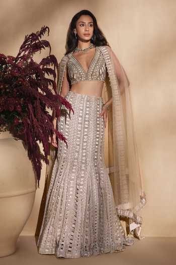 Niamh By Kriti Gold Organza, Satin, Net V-neck Moonlit Hand Embroidered Fishcut Lehenga Set at Aza Fashions Niamh By Kriti_Gold Organza, Satin, Net V-neck Moonlit Hand Embroidered Fishcut Lehenga Set _at_Aza_Fashions