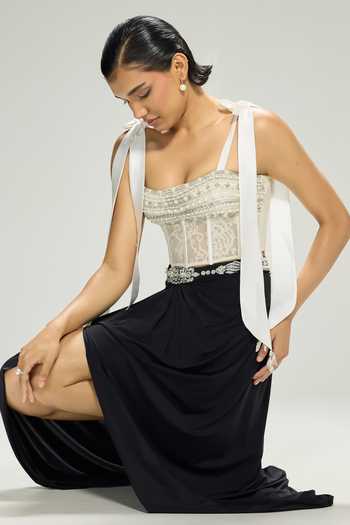 Buy Dilnaz Ivory Satin, Net, Lace Beads, Pearls, Stones, Crystals Pixie Embellished Corset Online at Aza Fashions Buy_Dilnaz_Ivory Satin, Net, Lace Beads, Pearls, Stones, Crystals Pixie Embellished Corset _Online_at_Aza_Fashions