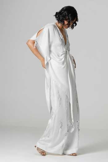 Buy_Dilnaz_Ivory Linen Disco Sequin Embroidered Flared Trouser _Online_at_Aza_Fashions