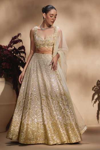 Shop Niamh By Kriti Gold Silk, Satin, Tissue Sweetheart Celestial Champagne Embellished Lehenga Set Online at Aza Fashions Shop_Niamh By Kriti_Gold Silk, Satin, Tissue Sweetheart Celestial Champagne Embellished Lehenga Set _Online_at_Aza_Fashions