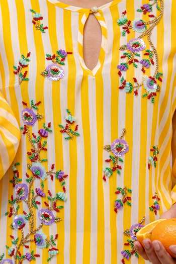 Nautanky_Yellow Crepe Keyhole Neck Soft Vector Striped Top And Pant Set _at_Aza_Fashions
