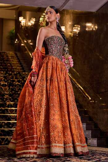 Shop Cedar & Pine Orange Brocade Bandeau Neck Heer Woven Lehenga Set Online at Aza Fashions Shop_Cedar & Pine_Orange Brocade Bandeau Neck Heer Woven Lehenga Set _Online_at_Aza_Fashions