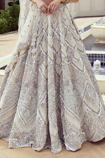 Roqa Ivory Net Sweetheart Neck Lumiere Imperial Embroidered Bridal Lehenga Set Online at Aza Fashions Roqa_Ivory Net Sweetheart Neck Lumiere Imperial Embroidered Bridal Lehenga Set _Online_at_Aza_Fashions