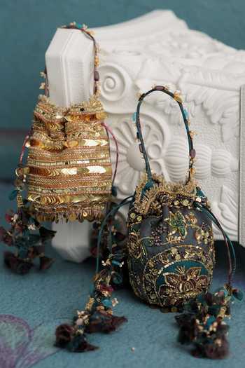 Mahima Mahajan Teal Embroidery, Sequins, Beads, Tassels Hand Floral Potli at Aza Fashions Mahima Mahajan_Teal Embroidery, Sequins, Beads, Tassels Hand Floral Potli _at_Aza_Fashions