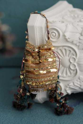 Mahima Mahajan Gold Sequins, Beads, Tassels Hand Embroidered Potli Online at Aza Fashions Mahima Mahajan_Gold Sequins, Beads, Tassels Hand Embroidered Potli _Online_at_Aza_Fashions