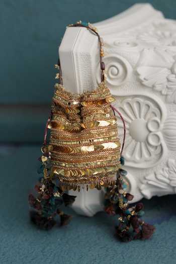 Buy Mahima Mahajan Gold Sequins, Beads, Tassels Hand Embroidered Potli Online at Aza Fashions Buy_Mahima Mahajan_Gold Sequins, Beads, Tassels Hand Embroidered Potli _Online_at_Aza_Fashions
