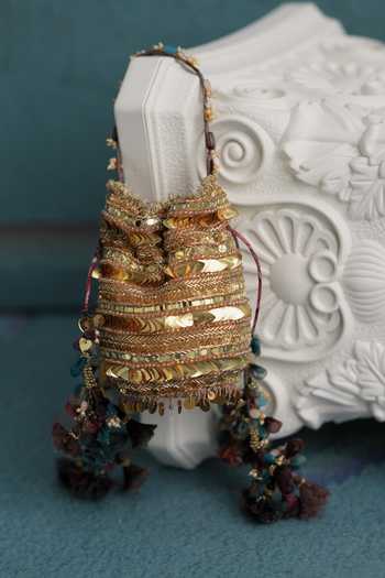 Shop Mahima Mahajan Gold Sequins, Beads, Tassels Hand Embroidered Potli Online at Aza Fashions Shop_Mahima Mahajan_Gold Sequins, Beads, Tassels Hand Embroidered Potli _Online_at_Aza_Fashions
