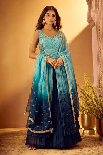 Samyukta Singhania Blue Silk, Georgette, Net V-neck, Yes Embroidered Slit Kurta Lehenga Set at Aza Fashions Samyukta Singhania_Blue Silk, Georgette, Net V-neck, Yes Embroidered Slit Kurta Lehenga Set _at_Aza_Fashions