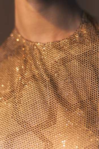ANGAD SINGH_Gold Net Halter Neck Aurelia Soft Blouse And Sharara Set _at_Aza_Fashions