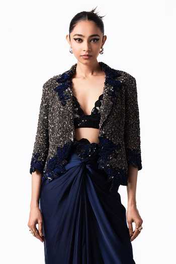 Nupur Kanoi Silver Crepe, Satin Plunge Neck Sequin Embroidered Blazer And Knot Skirt Set at Aza Fashions Nupur Kanoi_Silver Crepe, Satin Plunge Neck Sequin Embroidered Blazer And Knot Skirt Set _at_Aza_Fashions