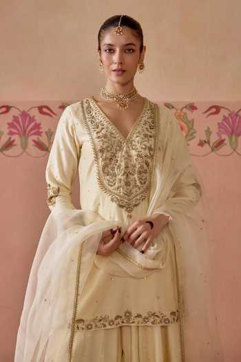 Shop Kritika Dawar Ivory Silk, Chanderi, Organza V-neck, Yes Gulnaar Embroidered Kurta Sharara Set Online at Aza Fashions Shop_Kritika Dawar_Ivory Silk, Chanderi, Organza V-neck, Yes Gulnaar Embroidered Kurta Sharara Set _Online_at_Aza_Fashions