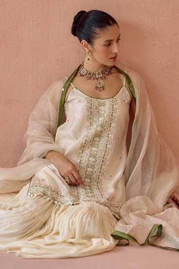 Kritika Dawar Ivory Silk, Chinon, Organza Scoop Neck, Yes Sahiba Embroidered Kurta Gharara Set at Aza Fashions Kritika Dawar_Ivory Silk, Chinon, Organza Scoop Neck, Yes Sahiba Embroidered Kurta Gharara Set _at_Aza_Fashions