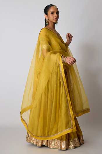 Shop_Rhua_Yellow Chanderi Silk, Silk, Organza V-neck Kesari Embroidered Top Lehenga Set _Online_at_Aza_Fashions