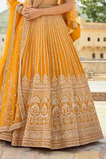 Buy Kalighata Rust Silk V-neck Shruti Embroidered Lehenga Set Online at Aza Fashions Buy_Kalighata_Rust Silk V-neck Shruti Embroidered Lehenga Set _Online_at_Aza_Fashions