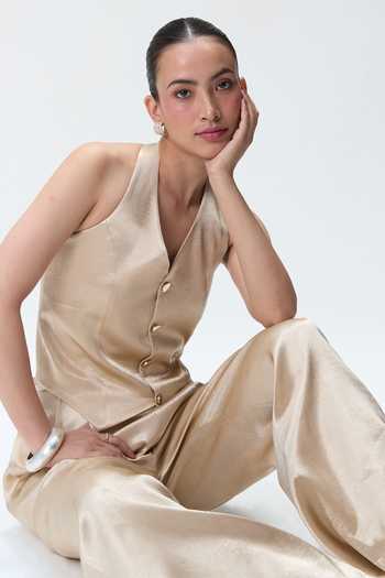 Shop Tara And I Beige Silk Halter Neck Champagne Waistcoat Online at Aza Fashions Shop_Tara And I_Beige Silk Halter Neck Champagne Waistcoat _Online_at_Aza_Fashions