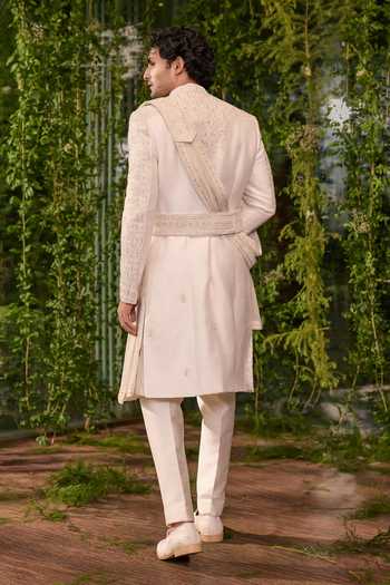 Shop Jigar & Nikita Ivory Silk, Chanderi Rajvansh The Modern Ruler Sherwani Set at Aza Fashions Shop_Jigar & Nikita_Ivory Silk, Chanderi Rajvansh The Modern Ruler Sherwani Set _at_Aza_Fashions