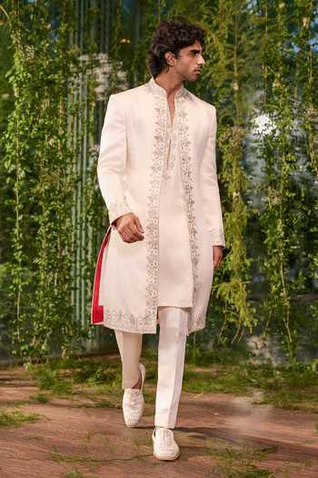 Buy Jigar & Nikita Ivory Satin Shvet Agni The Fearless King Sherwani Set Buy_Jigar & Nikita_Ivory Satin Shvet Agni The Fearless King Sherwani Set
