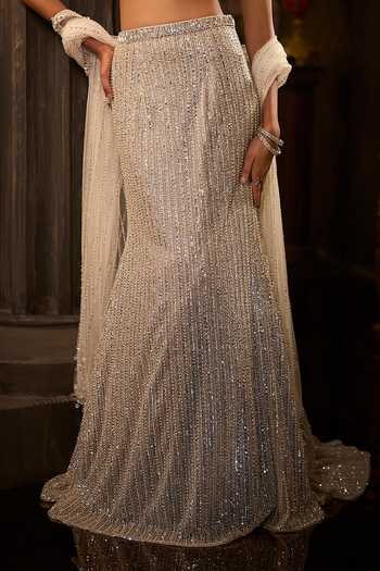 Seema Gujral Silver Net Sweetheart Neck Sequin Work Fish Cut Bridal Lehenga Set at Aza Fashions Seema Gujral_Silver Net Sweetheart Neck Sequin Work Fish Cut Bridal Lehenga Set _at_Aza_Fashions