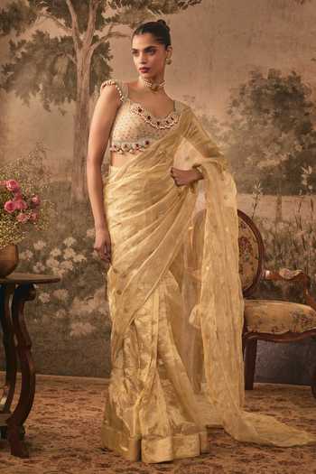 Vana Ethnics Gold Silk, Tissue, Jacquard Sweetheart Pre-draped Saree With Embellished Blouse at Aza Fashions Vana Ethnics_Gold Silk, Tissue, Jacquard Sweetheart Pre-draped Saree With Embellished Blouse _at_Aza_Fashions