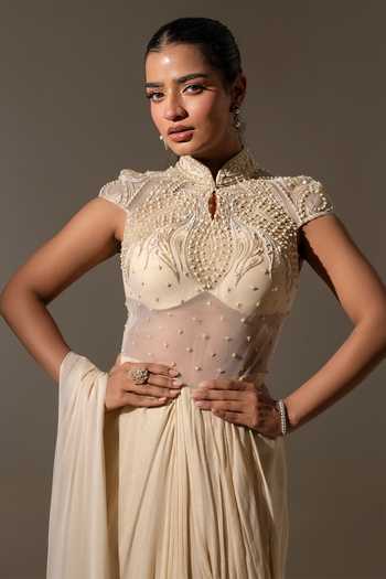 K-Anshika_Ivory Georgette, Net Embroidery, Pearls High Neck Saree Gown _Online_at_Aza_Fashions
