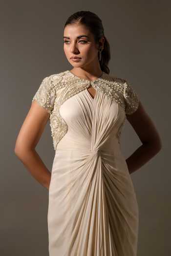 K-Anshika Off White Georgette, Net Beads, Pearls Keyhole Neck Embellished Draped Gown Online at Aza Fashions K-Anshika_Off White Georgette, Net Beads, Pearls Keyhole Neck Embellished Draped Gown _Online_at_Aza_Fashions