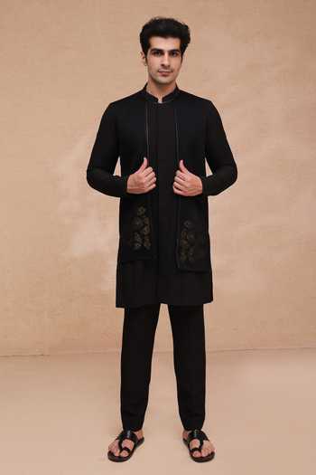 Manish Nagdeo Black Lycra Asymmetric Panelled Kurta And Pant Set at Aza Fashions Manish Nagdeo_Black Lycra Asymmetric Panelled Kurta And Pant Set _at_Aza_Fashions