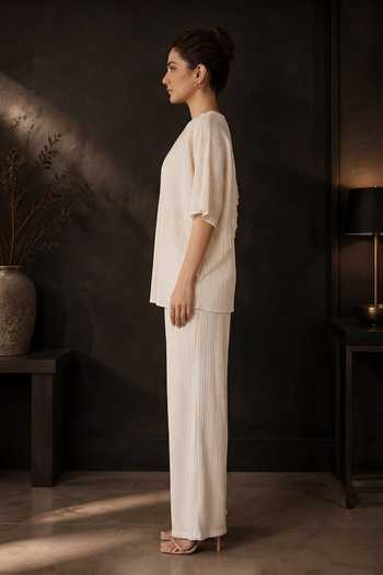 Crimp Ivory Polyester V-neck Pleated Top And Pant Set Online at Aza Fashions Crimp_Ivory Polyester V-neck Pleated Top And Pant Set _Online_at_Aza_Fashions