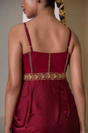 Rasasvada Maroon Crepe Embroidery, Zari Sweetheart Neck Embellished Pre-draped Saree Gown at Aza Fashions Rasasvada_Maroon Crepe Embroidery, Zari Sweetheart Neck Embellished Pre-draped Saree Gown _at_Aza_Fashions
