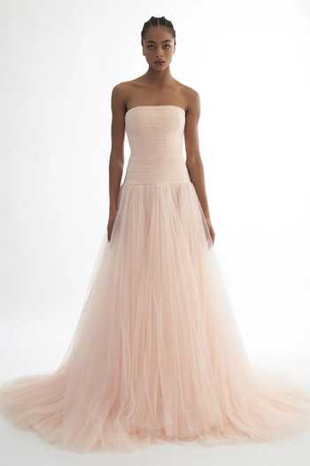 Buy Gauri & Nainika Pink Net Off-shoulder Fluted Corseted Pleated Gown at Aza Fashions Buy_Gauri & Nainika_Pink Net Off-shoulder Fluted Corseted Pleated Gown _at_Aza_Fashions