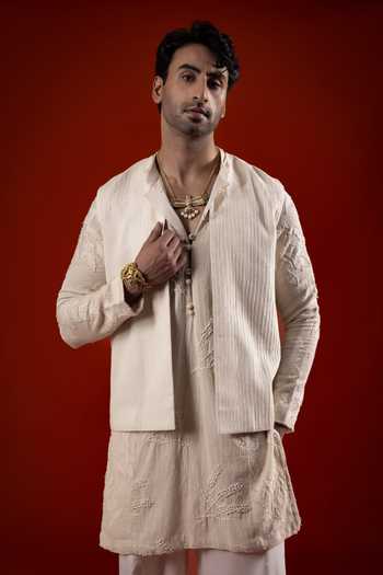 Buy Sanchit Sharma Ivory Cotton Textured Kurta Set With Bundi Online at Aza Fashions Buy_Sanchit Sharma_Ivory Cotton Textured Kurta Set With Bundi _Online_at_Aza_Fashions