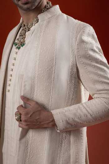 Sanchit Sharma Ivory Silk Textured Kurta And Jacket Set at Aza Fashions Sanchit Sharma_Ivory Silk Textured Kurta And Jacket Set _at_Aza_Fashions