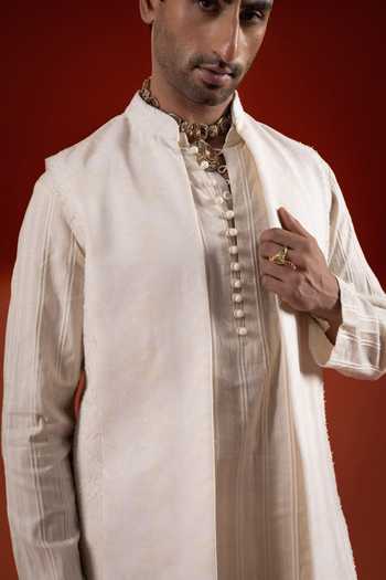 Shop Sanchit Sharma Ivory Silk, Cotton Embroidery Layered Bundi And Kurta Set Online at Aza Fashions Shop_Sanchit Sharma_Ivory Silk, Cotton Embroidery Layered Bundi And Kurta Set _Online_at_Aza_Fashions