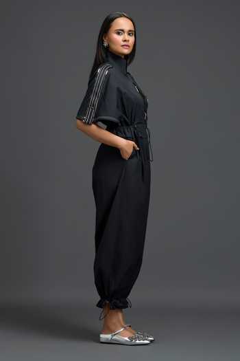 Deepika Arora Black Leather High Neck Metallic Floral Patch Jumpsuit Online at Aza Fashions Deepika Arora_Black Leather High Neck Metallic Floral Patch Jumpsuit _Online_at_Aza_Fashions