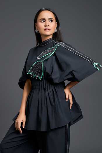 Deepika Arora Black Leather High Neck Smocked Peplum Top And Pant Set at Aza Fashions Deepika Arora_Black Leather High Neck Smocked Peplum Top And Pant Set _at_Aza_Fashions
