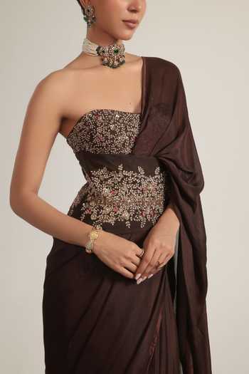 Label Niti Bothra Brown Crepe Pearls, Stones Bandeau Neck Embroidered Corset With Saree at Aza Fashions Label Niti Bothra_Brown Crepe Pearls, Stones Bandeau Neck Embroidered Corset With Saree _at_Aza_Fashions