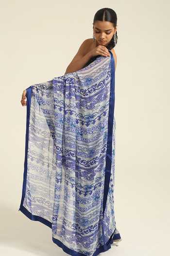 Poonam Dubey_Blue Georgette Sweetheart Neck Ziana Printed Pre-draped Saree With Corset Blouse _at_Aza_Fashions