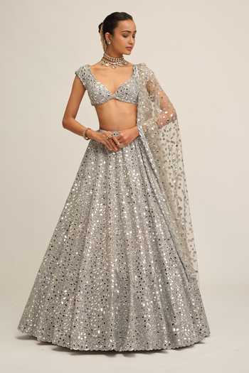 Shop Vvani by vani vats Silver Crepe, Net V-neck Handcut Mirror Work Lehenga Set Online at Aza Fashions Shop_Vvani by vani vats_Silver Crepe, Net V-neck Handcut Mirror Work Lehenga Set _Online_at_Aza_Fashions
